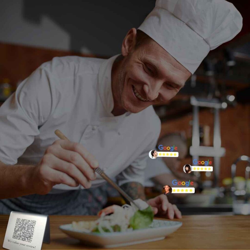 The image shows a chef in a professional kitchen plating a dish with great care. He is smiling and wearing a white uniform and chef's hat, emphasizing his passion for quality culinary presentation. In the foreground, there’s a small sign with a QR code and the message, "We value your review!" Above the chef, Google review icons with five-star ratings and customer profile images are displayed, promoting positive feedback. This aligns with Klimax Group's dedication to excellence and customer satisfaction, encouraging clients to leave reviews and engage with their services.